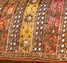 Regal Radiance Multicolor Embroidered Clutch with Mirror Work & Chain Strap