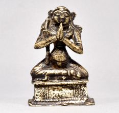 Male God Figure Sitting with Axe