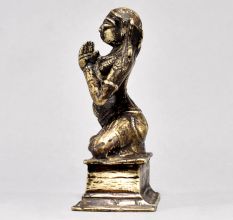 Male God Figure Sitting with Axe