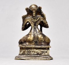Male God Figure Sitting with Axe