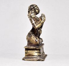 Male God Figure Sitting with Axe