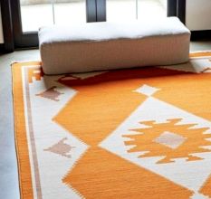 Hand Knotted Orange And Ivory Rug