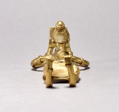 Tribal Woman Lying and Reading Figurine