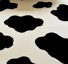 Handtufted Cow Print Cozy Rug