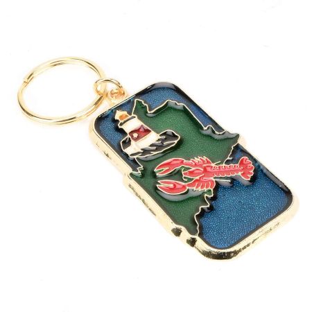 Brass Key Chain With Red Lobster Swimming Near A Lighthouse