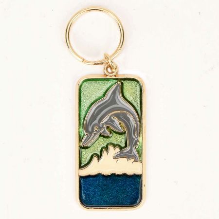 Grey Dolphin With Green Blue Colors On Brass Key Chain