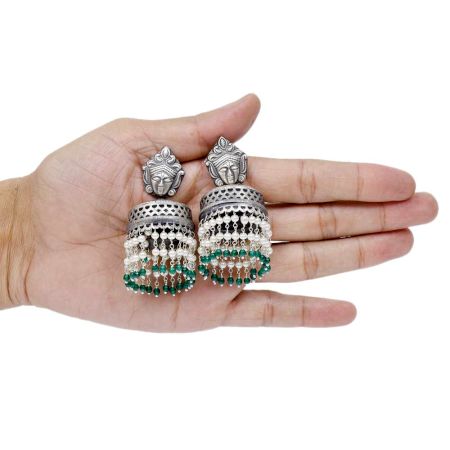 Handmade Oxidized Silver Goddess Face Drum Jhumkis With Pearl And Green Bead Tassels