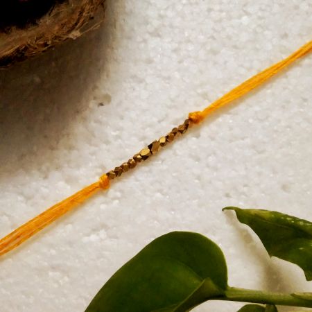 Brass Beads Beads Rakhi for Festive Gifting