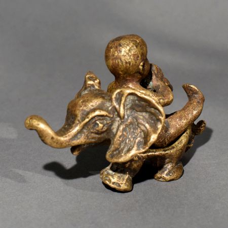 Vintage Brass Baby Riding Elephant Statue for Collection