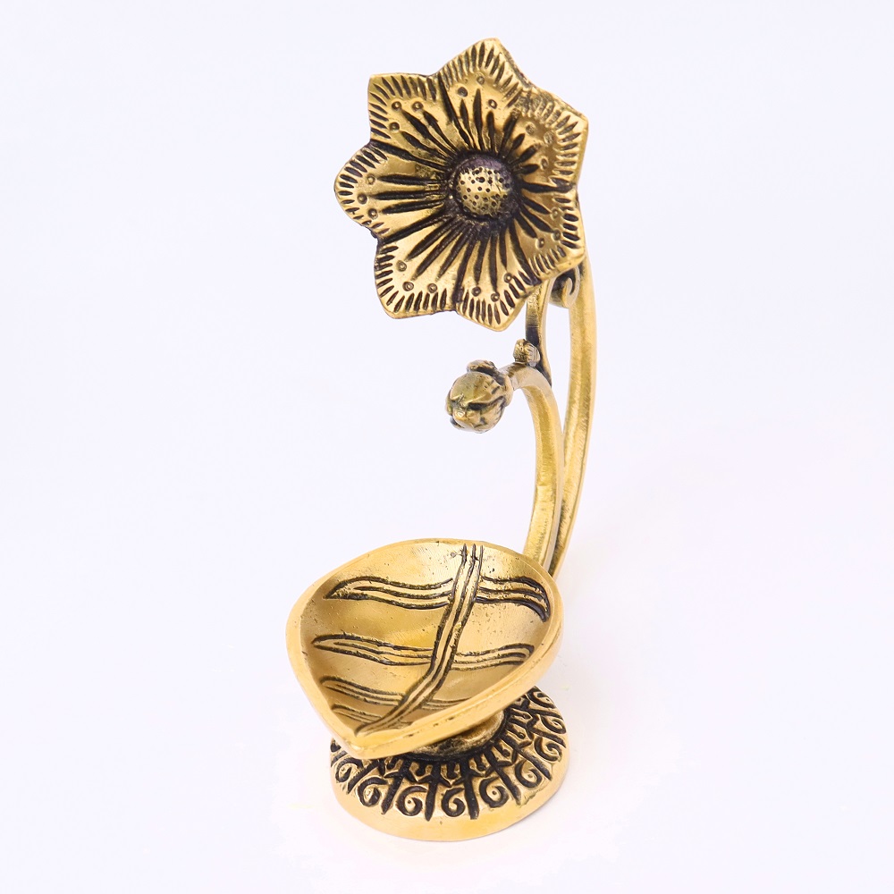 Brass Diya With Flower On Top