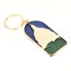 Brass Whitehouse Brass Key Ring With Blue Background
