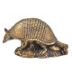 Bronze Armadillo Sitting on a Log