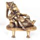 Brass Ganesh Statue Sitting On A Throne