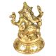 Brass Ganesha Sitting On A Raised Platform