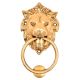 Brass Lion Head Door Knocker With A large Brass Ring Gripped In Its Mouth
