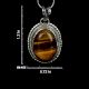92.5 Sterling Silver Pendant Studded With Big Oval Tiger Eye Stone Decorative Border