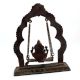 Brass Ganesha Sitting On Swing With Decorative Prabhavali