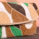 Earth Rhythm Abstract Beaded Clutch with Gold Chain Strap | Green, Brown & White Party Sling Bag