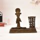 Vintage Brass Tribal Man Playing Instrument Statue in Bastar Art