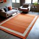 Hand Knotted Orange And Beige Rug