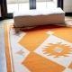 Hand Knotted Orange And Ivory Rug