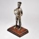 Handcrafted Vintage Soldier Figurine with Wooden Base