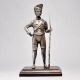 Handcrafted Vintage Soldier Figurine with Wooden Base