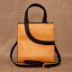 Compact Tan Leather Handbag with Zipper Closure