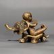 Vintage Brass Baby Riding Elephant Statue for Collection