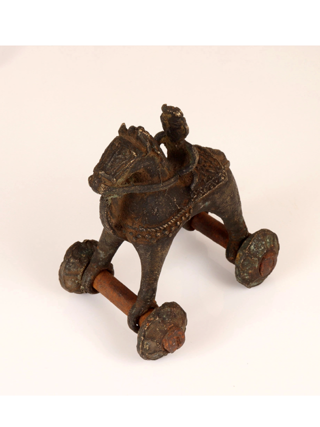 Bronze Chariot Anchors the Room